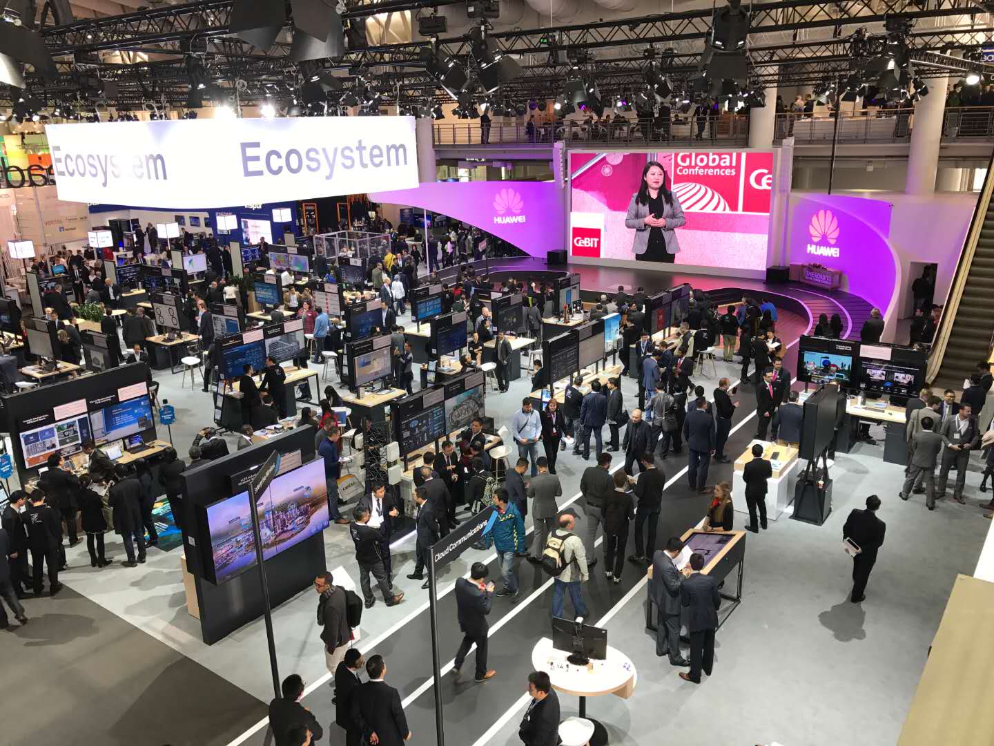 Track event with athletic participants, timing equipment, and outdoor venue setup