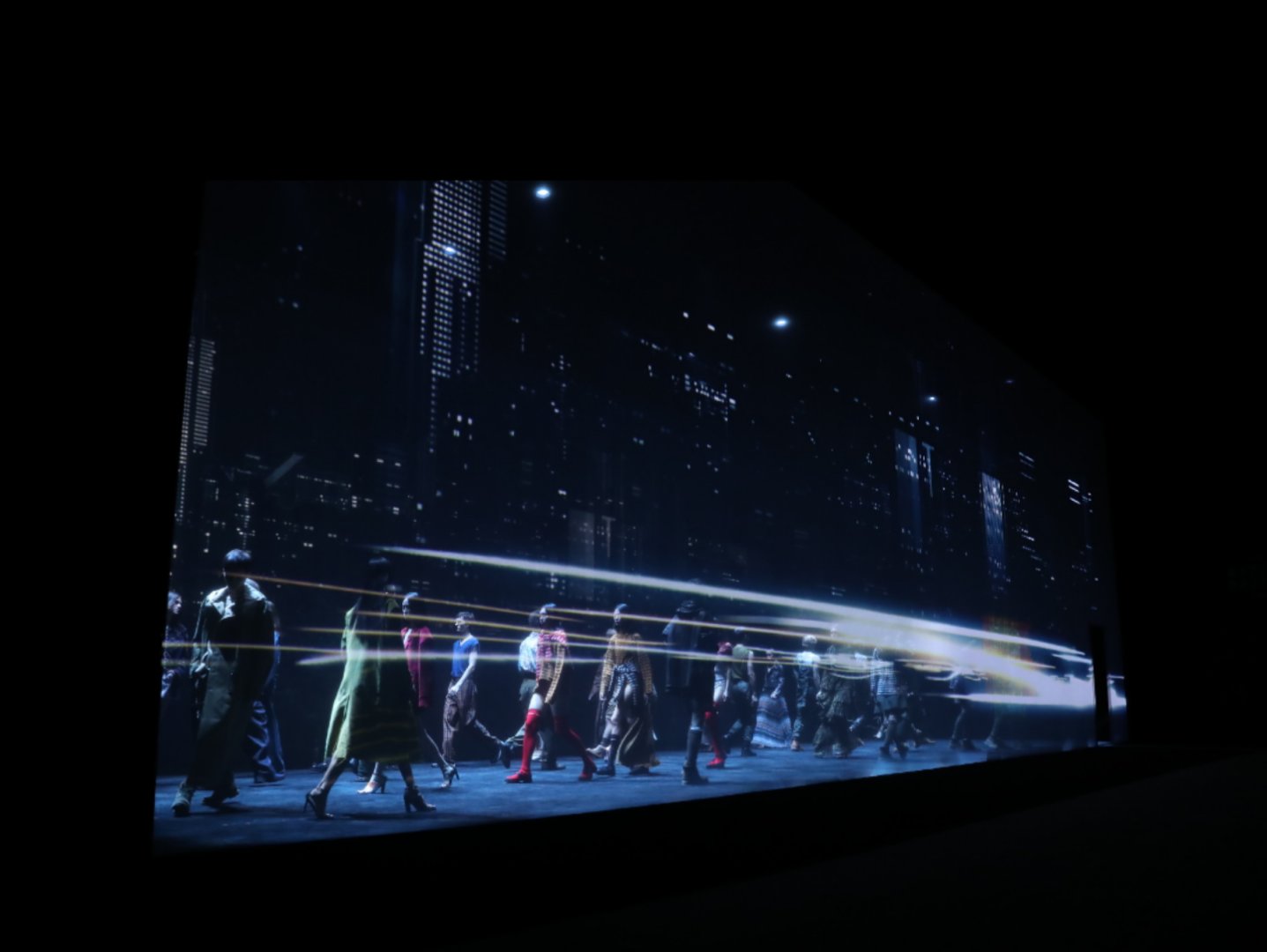 Brand launch event with modern stage setup, professional lighting, and corporate attendees